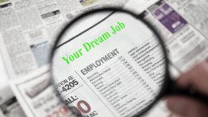 Magnifying glass focused on the text that reads "your dream job"